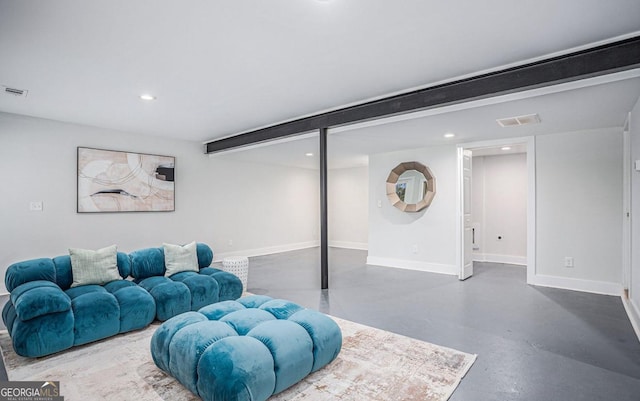 living room featuring concrete flooring