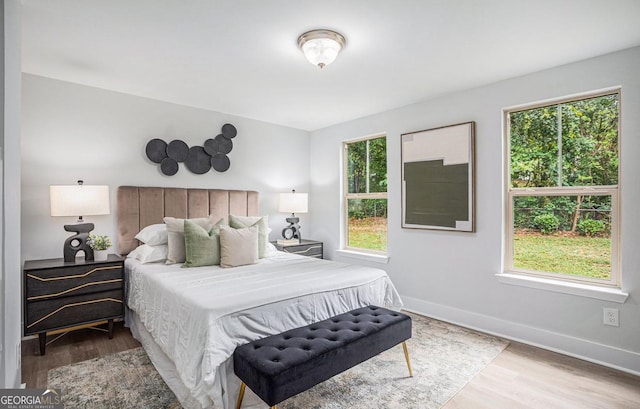 bedroom featuring light hardwood / wood-style floors