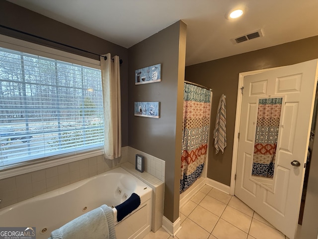 bathroom with tile patterned flooring and plus walk in shower