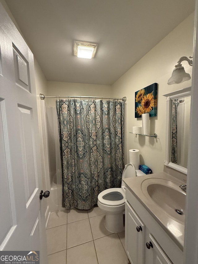 full bathroom with tile patterned flooring, vanity, shower / bath combination with curtain, and toilet