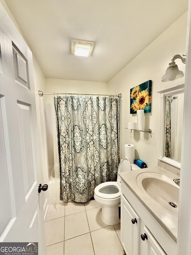 bathroom with tile patterned flooring, toilet, vanity, and shower / bathtub combination with curtain