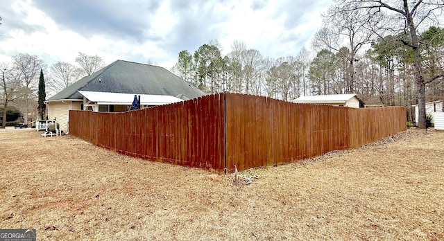 view of yard with fence