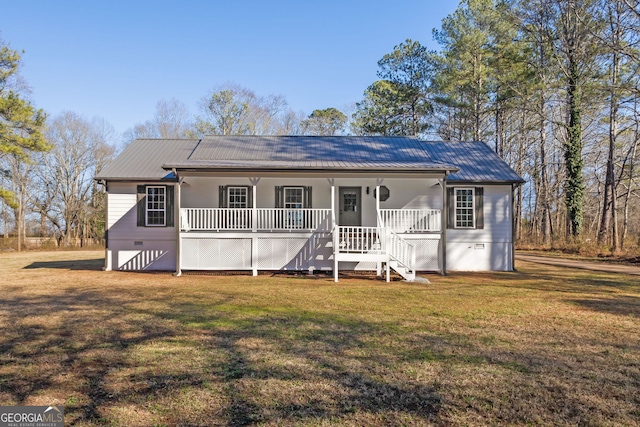 view of front of property with a front lawn and covered porch