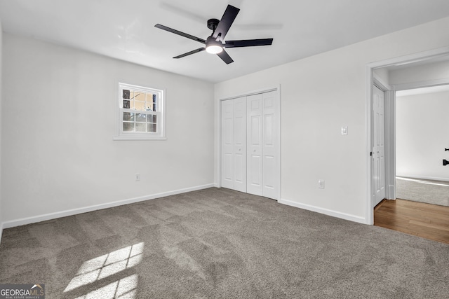 unfurnished bedroom with a closet, ceiling fan, and carpet flooring