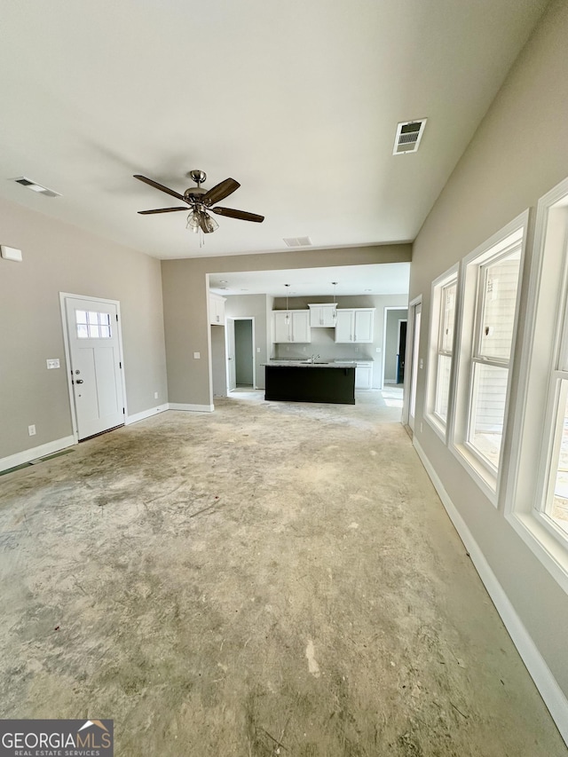 view of patio / terrace featuring ceiling fan