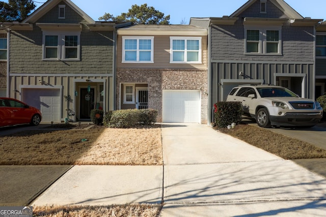 multi unit property featuring a garage