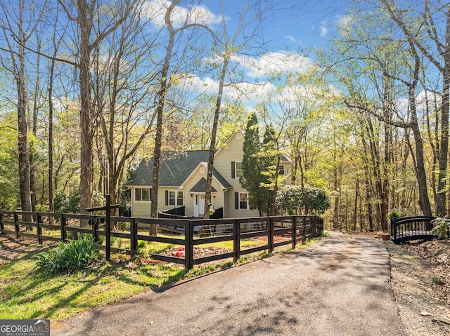196 Beaver Lake Dr, Ellijay, GA 30540 - view of front of house featuring a shingled roof and a fenced front yard