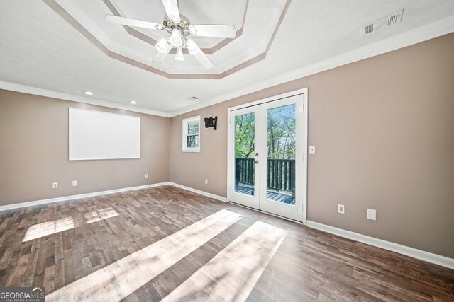 196 Beaver Lake Dr, Ellijay, GA 30540 - unfurnished room with visible vents, ceiling fan, crown molding, a tray ceiling, and french doors