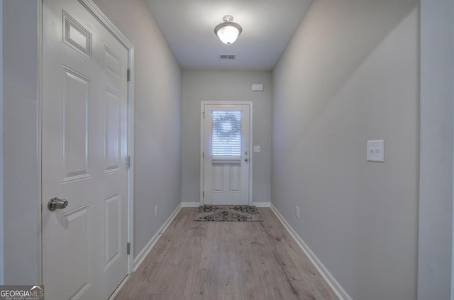 doorway featuring light hardwood / wood-style floors