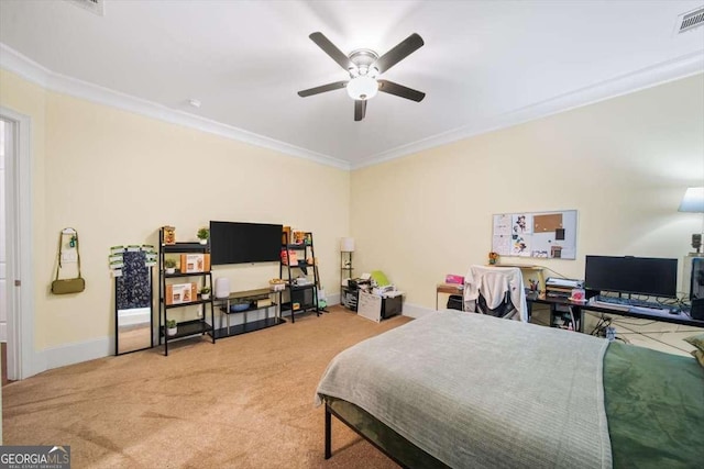 bedroom with crown molding, carpet floors, and ceiling fan