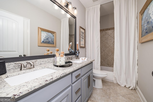 full bathroom featuring vanity, tile patterned flooring, shower / bath combination with curtain, and toilet