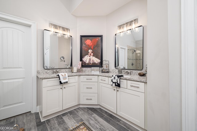 bathroom with vanity and walk in shower