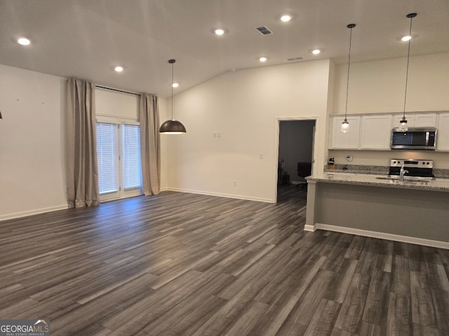 kitchen featuring pendant lighting, sink, appliances with stainless steel finishes, white cabinetry, and light stone countertops