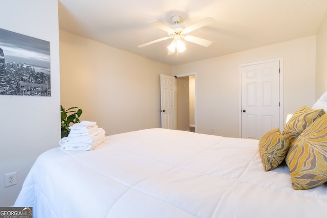 bedroom featuring ceiling fan