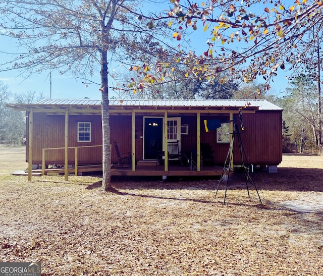 277 Deer Run Rd, Folkston, GA 31537 - rear view of property with a porch and metal roof