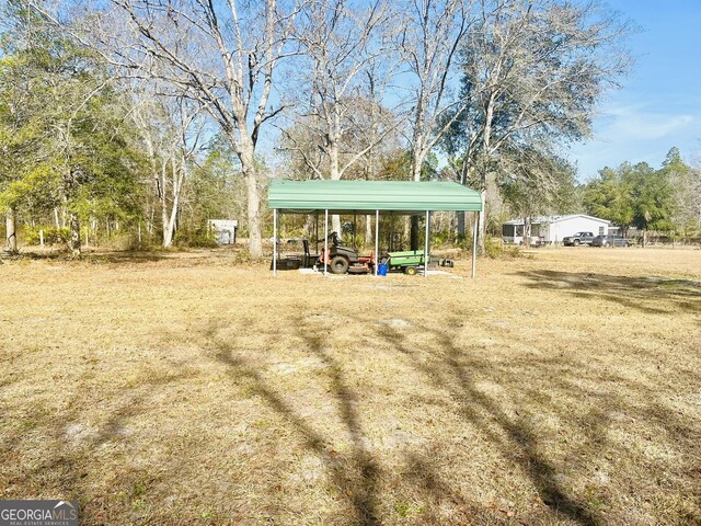 277 Deer Run Rd, Folkston, GA 31537 - view of yard with a detached carport