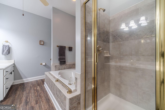 bathroom with vanity, separate shower and tub, wood-type flooring, and ceiling fan