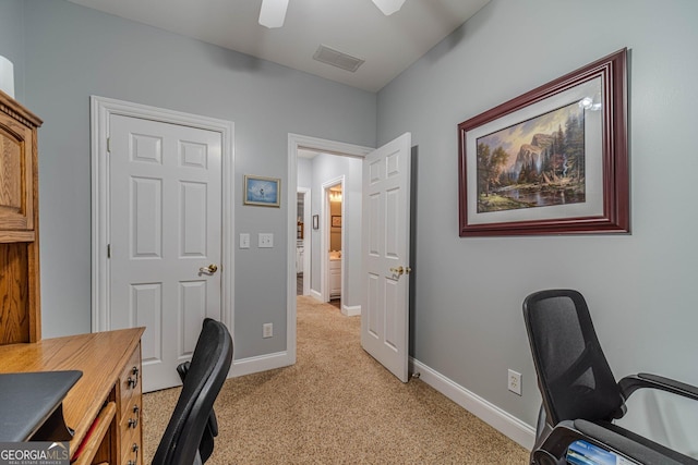 office area with light carpet and ceiling fan