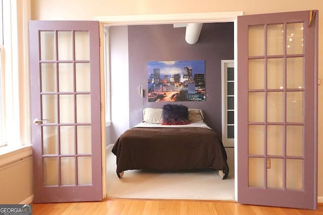 bedroom featuring wood-type flooring