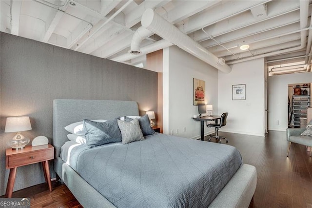 bedroom featuring dark hardwood / wood-style floors