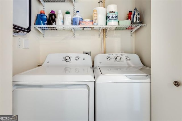 laundry area with separate washer and dryer