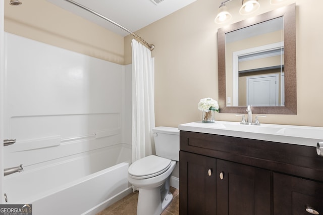 full bathroom with vanity, shower / tub combo with curtain, tile patterned floors, and toilet