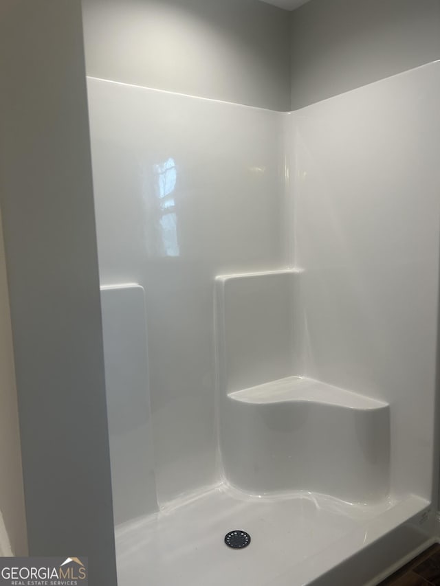 bathroom with walk in shower