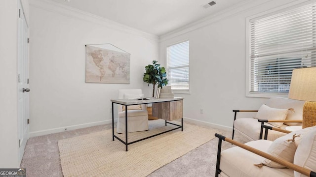 office space featuring crown molding and light colored carpet