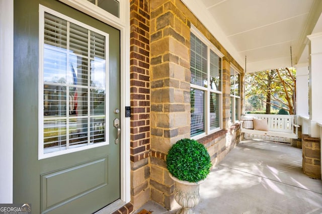 property entrance with a porch