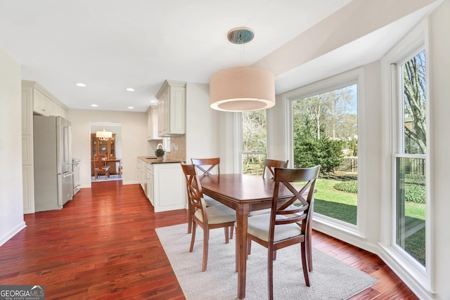 dining room featuring dark wood-type flooring