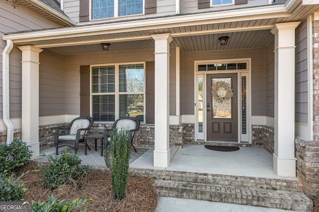 property entrance featuring covered porch