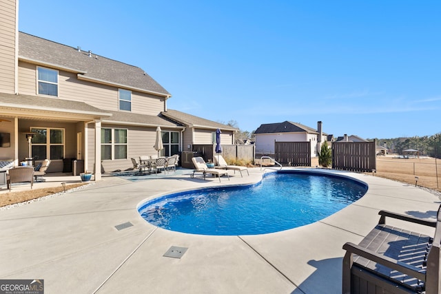 view of pool featuring a patio area