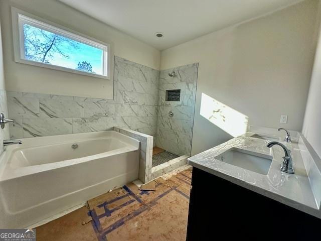 bathroom with vanity and independent shower and bath