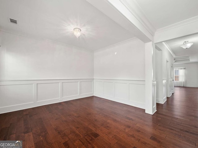 unfurnished room featuring crown molding and dark wood-type flooring
