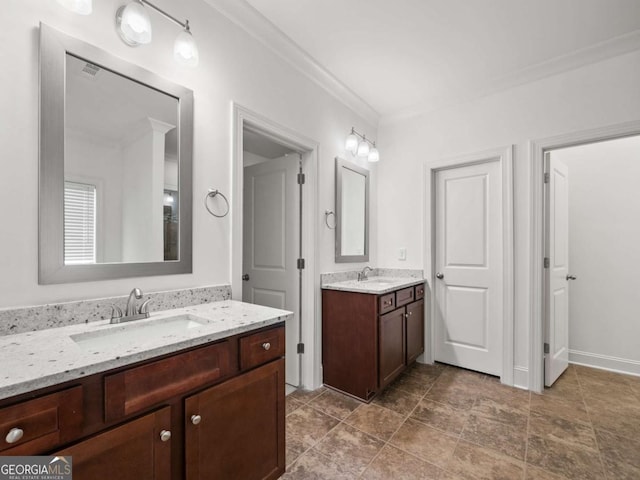 bathroom with vanity and crown molding