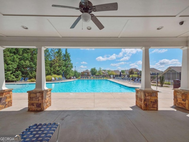 view of swimming pool with ceiling fan