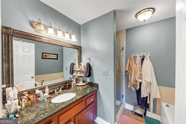 bathroom with vanity, shower with separate bathtub, and tile patterned flooring