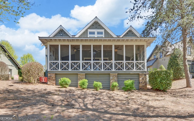 view of front of property featuring a sunroom