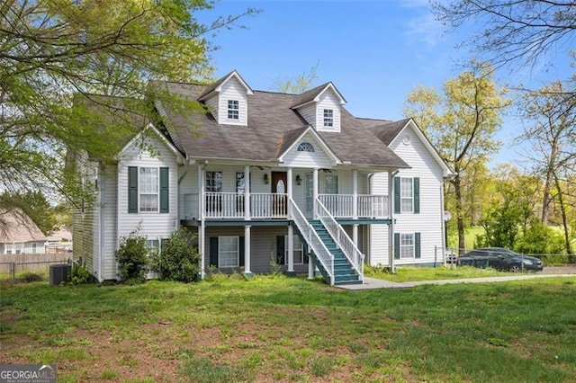 view of front of home with a porch and a front lawn