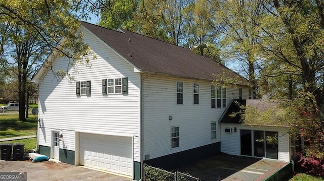 view of home's exterior featuring a garage