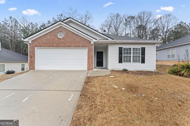 single story home featuring a garage and a front lawn