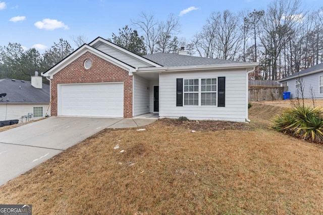 ranch-style house with a garage and a front yard