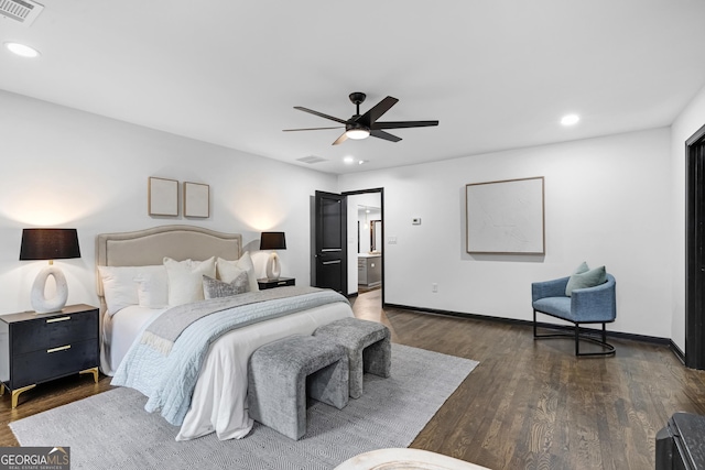 bedroom with dark wood-type flooring and ceiling fan