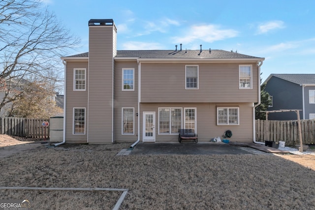 rear view of house with a patio area