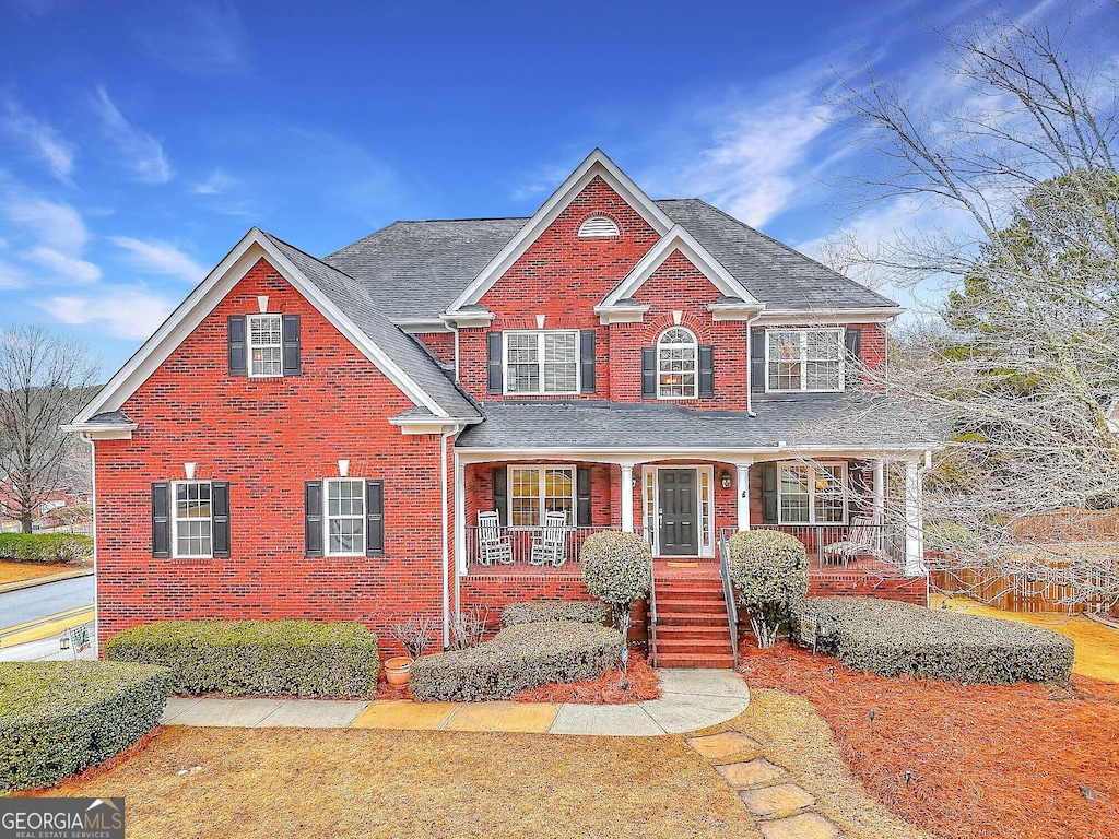 view of front of home featuring covered porch