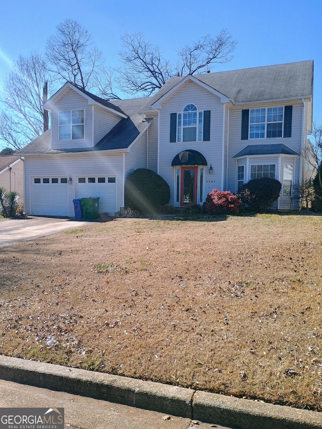 view of front of home with a garage