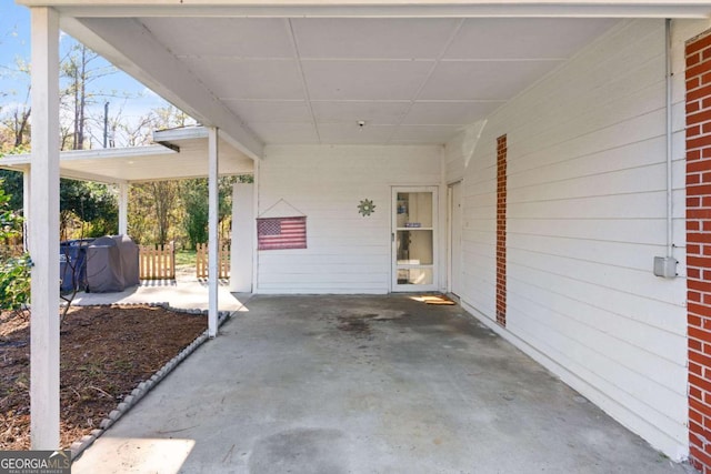 view of patio / terrace featuring a carport