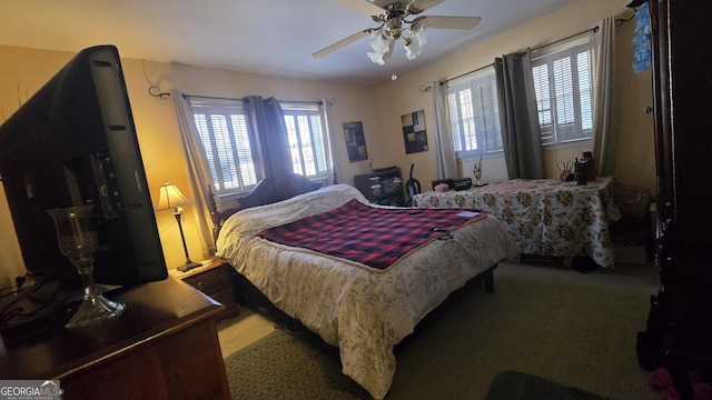 bedroom featuring carpet floors and ceiling fan