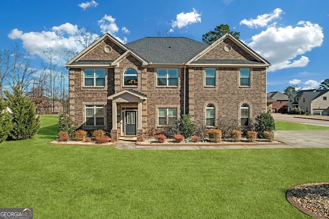 view of front of home featuring a front yard