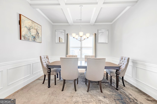 dining room with beamed ceiling, coffered ceiling, light colored carpet, and an inviting chandelier